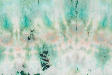 İpek kumaş dokusunda yeşil tonlarda soyut desen kapat