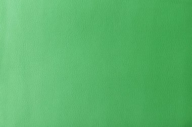 Gerçek deri dokusu, yapay deri kaplama yeşil arka plan.