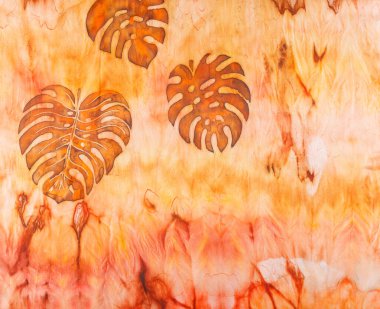 Sarı ve kahverengi tonlarda ipek kumaş dokusunda soyut desen