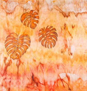 Sarı ve kahverengi tonlarda ipek kumaş dokusunda soyut desen