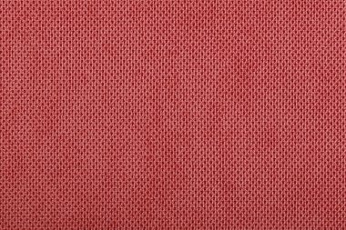 Kırmızı kumaş pamuk dokusu. Tekstil arkaplan kumaşı kapat