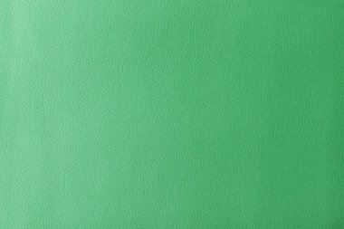 Gerçek deri dokusu, yapay deri kaplama yeşil arka plan.
