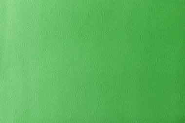 Gerçek deri dokusu, yapay deri kaplama yeşil arka plan.