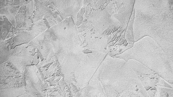 Doğal dokusu olan gri beton yüzey deseni. İnşaat temaları, minimalist tasarımlar ve sanatsal projeler için harika..