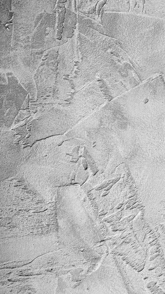 Doğal dokusu olan gri beton yüzey deseni. İnşaat temaları, minimalist tasarımlar ve sanatsal projeler için harika..