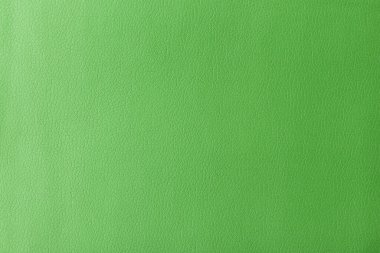 Gerçek deri dokusu, yapay deri kaplama yeşil arka plan.