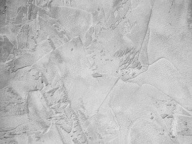 Endüstriyel beton dokusu ve kabarık gri kaplama. Şehir dekorasyonu, üretim temaları ve cesur tasarım fikirleri için mükemmel..