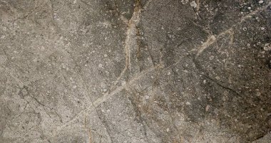 Beyaz arka planda doğal damarları olan koyu kahverengi bir fayans dokusu iç mekanları geliştirir. Sıcak şablonu ev dekorasyonuna lüks bir hava katıyor..