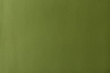 Gerçek deri dokusu, yapay deri kaplama yeşil arka plan.