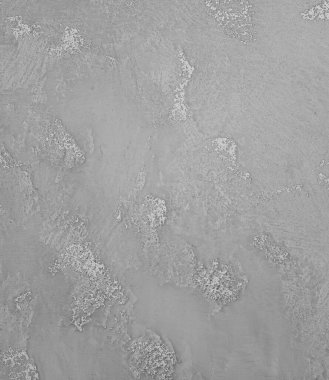 Beyaz arka planda gri bir tonu olan beton duvar dokusu iç mekanları geliştirir. Dokulu görünüşü son moda bir şehir havası getiriyor..