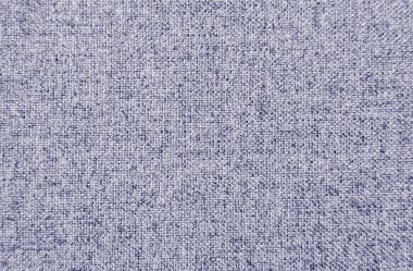 Doğal dokuma desenli yumuşak kumaş arkaplanı. Moda tasarımı, iç dekorasyon ve yaratıcı projeler için mükemmel. Mor, menekşe rengi yakın plan.
