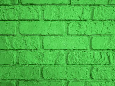 Engebeli bir yüzeyi olan yeşil tuğla duvar dokusu çeşitli tasarım projelerine uygun. Benzersiz rengi iç mekanlara modern bir kıvrım katıyor..
