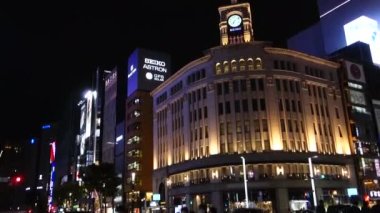 November 05, 2022: Night view of the gorgeous clock tower in the glamorous city of Tokyo Ginza, Tokyo, Japan