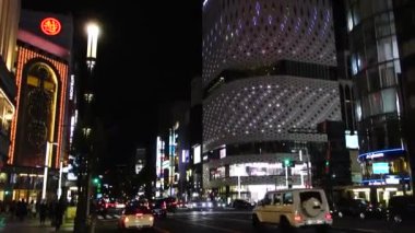 November 05, 2022: Tokyo, Japan, elegant and gorgeous Ginza night view, dazzling famous buildings at the 4-chome intersection