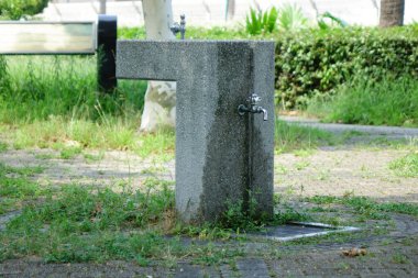  A drinking fountain along the promenade along Yokosuka coast in midsummer                              