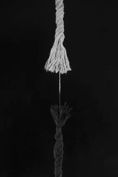 tearing rope isolated on black background - Stock Image - Everypixel