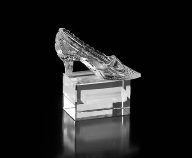 glass slipper isolated on black background