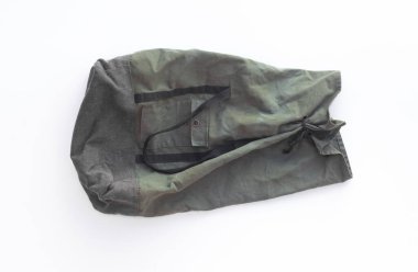 old canvas backpack isolated on white background