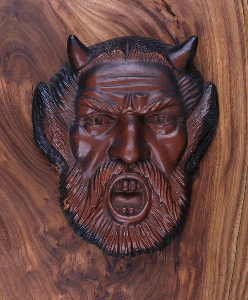 sculpture face of the devil