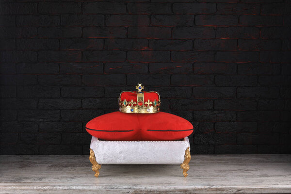 stand with cushion with a crown