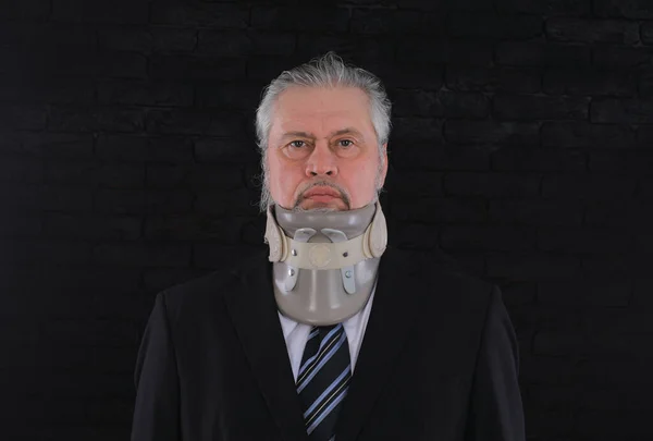 old man with medical neck brace