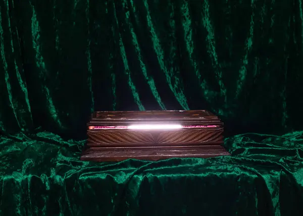 stock image magical wooden box on green velvet