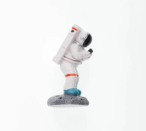 stock image astronaut toy figurine isolated on white background