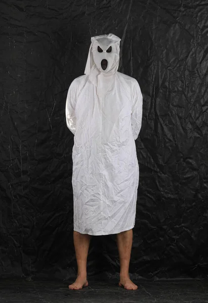 stock image scary ghost in white on a black background