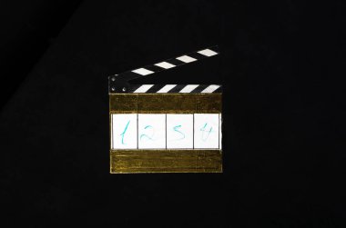Clapperboard beyaz arkaplanda izole edildi