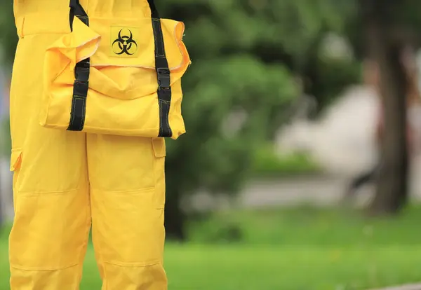 virologist in yellow clothes