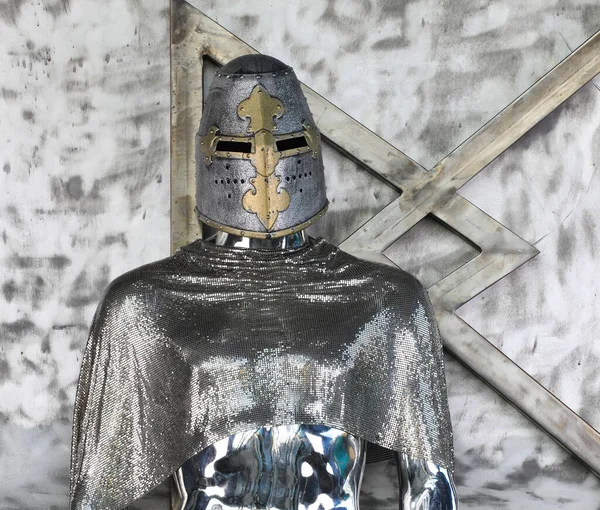 portrait of a medieval knight in a helmet and armor