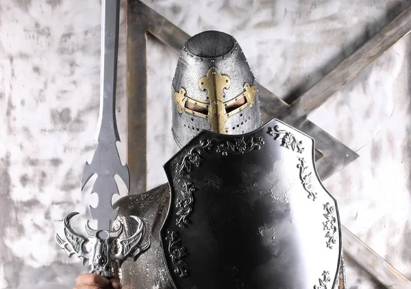 portrait of a medieval knight in a helmet and armor