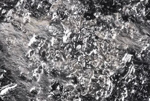 溶かされた金属の背景および質 ロイヤリティフリーのストック画像