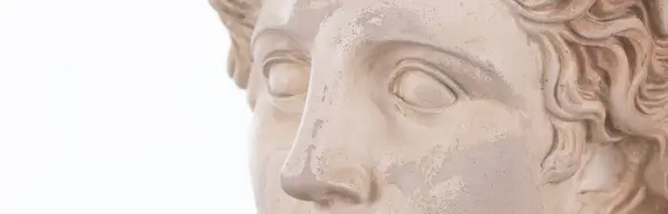 close-up portrait of the face of the sculpture of Apollo