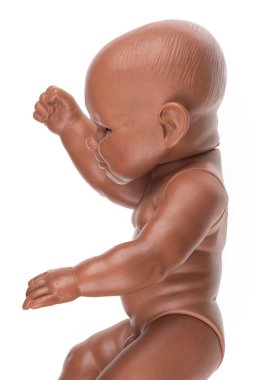 beyaz arka planda izole edilmiş çıplak oyuncak bebek çocuk.