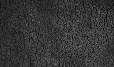 Siyah yüzeyin çatlaklı soyut cadılar bayramı arkaplanı