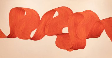 Sarı duvardaki kırmızı spiral çizginin soyut deseni