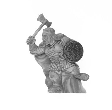 Beyaz arkaplanda izole edilmiş oyuncak Viking heykeli