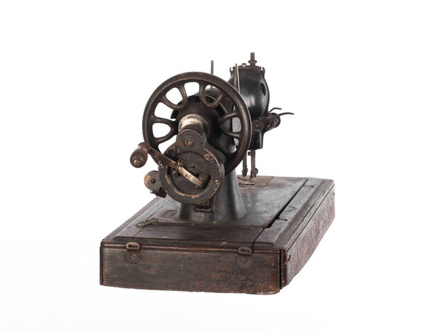  black ancient sewing retro machine isolated on white background
