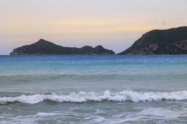 stock image View over the sea to the mountains in the bay of Agios Georgios on the island of Corfu in the evening