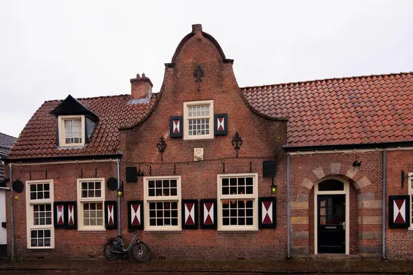 stock image A house with a clinker brick facade on a rainy day in the Netherlands in Bergen, 28 March 2024