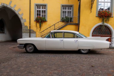 Cadillac Sedan Deville built in 1960 in the old town of Meersburg, Germany, 27.9.2024 clipart