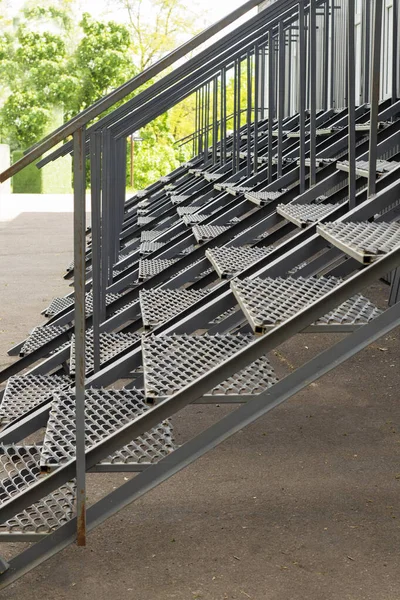external staircase: row of external metal steps, detail of electro-welded mesh, in galvanized and then painted steel. High quality photo