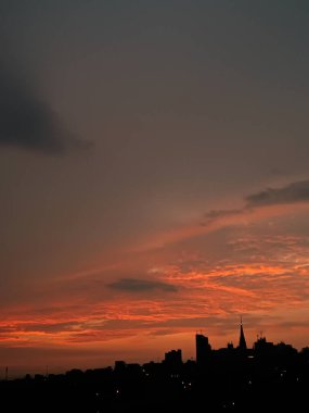 Sunset over Manizales with the city in silhouette