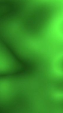 Yeşil renk hareketli dikey video gradyan ve bulanık arkaplan. Arkaplan ve dokular.