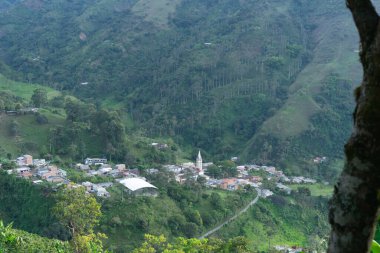 Top view of the town of Carmen de la Venta in the department of Antioquia in Colombia. Rural mountain areas. clipart