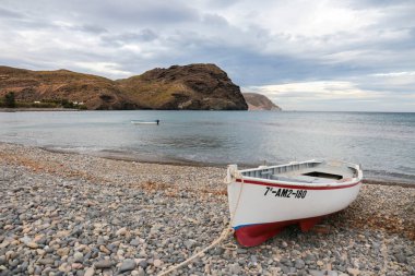 Boat under Stormy weather on the beach in Las Negras, Cabo de Gata, Almeria, Spain