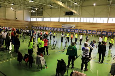 Santa Pola, Alicante, Spain- January 8, 2023: Athletes participating in the Provincial Archery Championship in Santa Pola, Spain