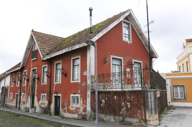 Queluz, Lisbon, Portugal- November 22, 2022:Old colorful and bright typical facade of traditional buildings of Queluz, Lisbon