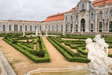 Lisbon, Portugal- November 28, 2022:Topiary art garden in the Garden of Queluz Palace in winter